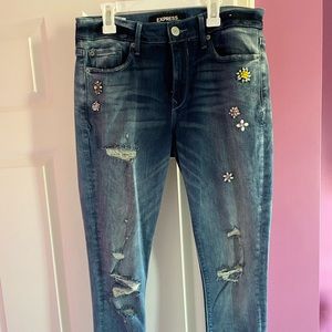 Express denim jeans with beaded flowers